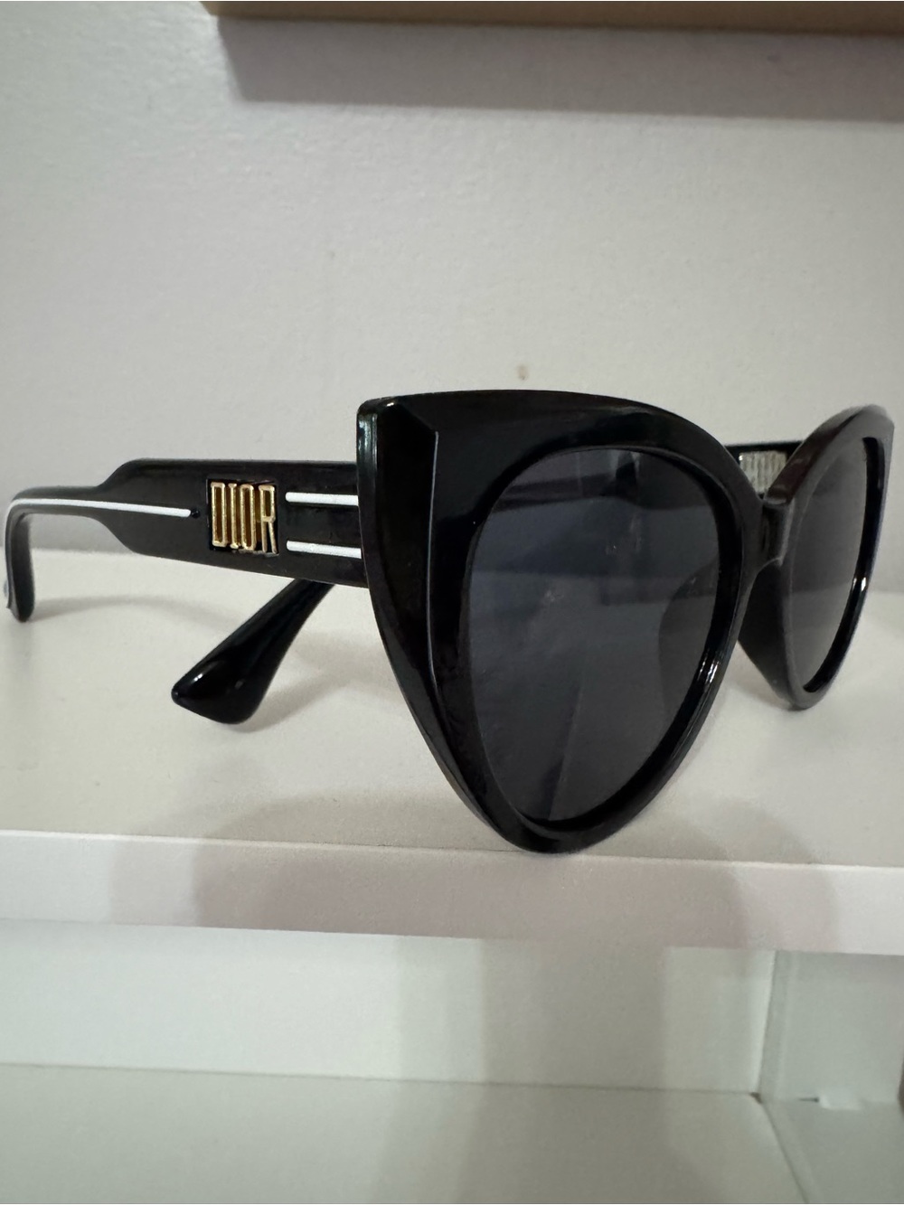 Dior Black Cat-Eye Sunglasses with Gold Logo Accents